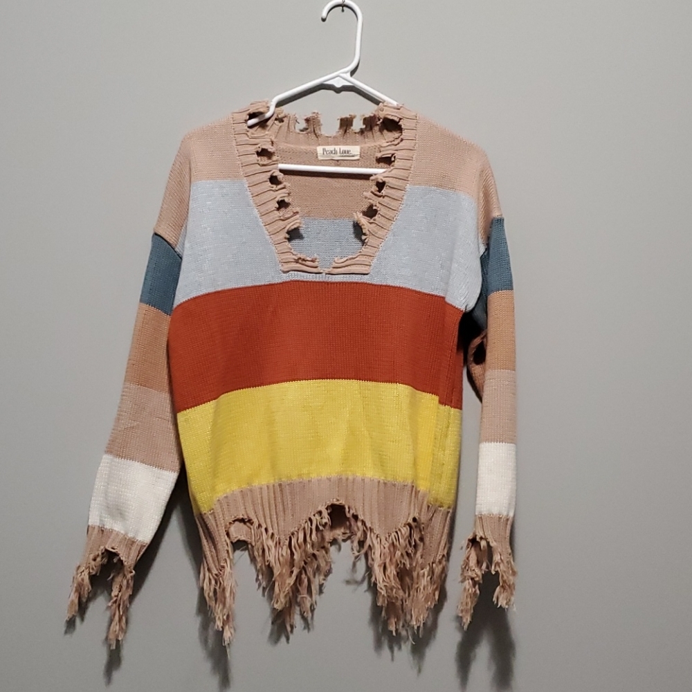 Peach Love size small. Frayed edge sweater